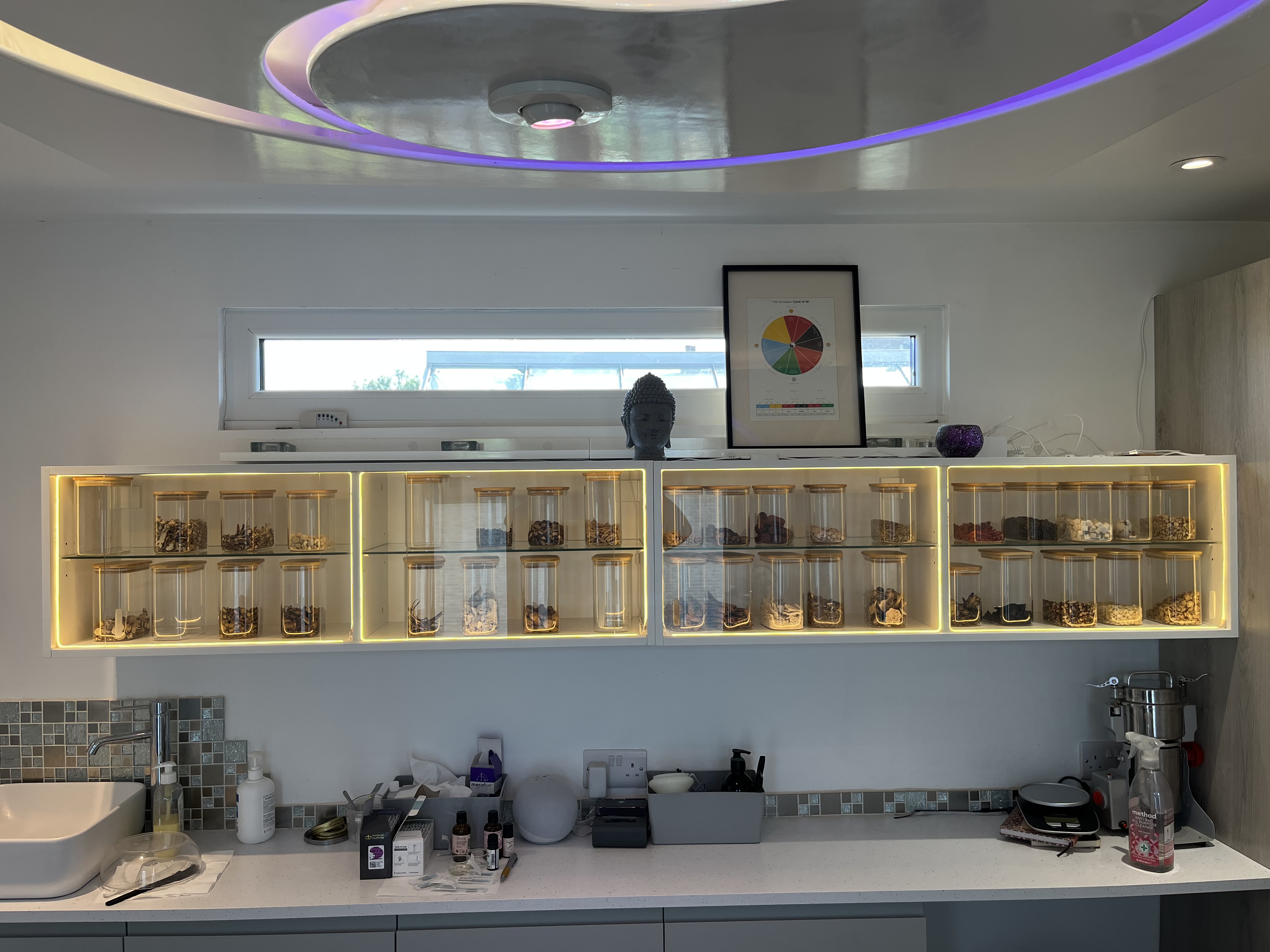 Balance Acupuncture clinic interior with yin-yang ceiling feature